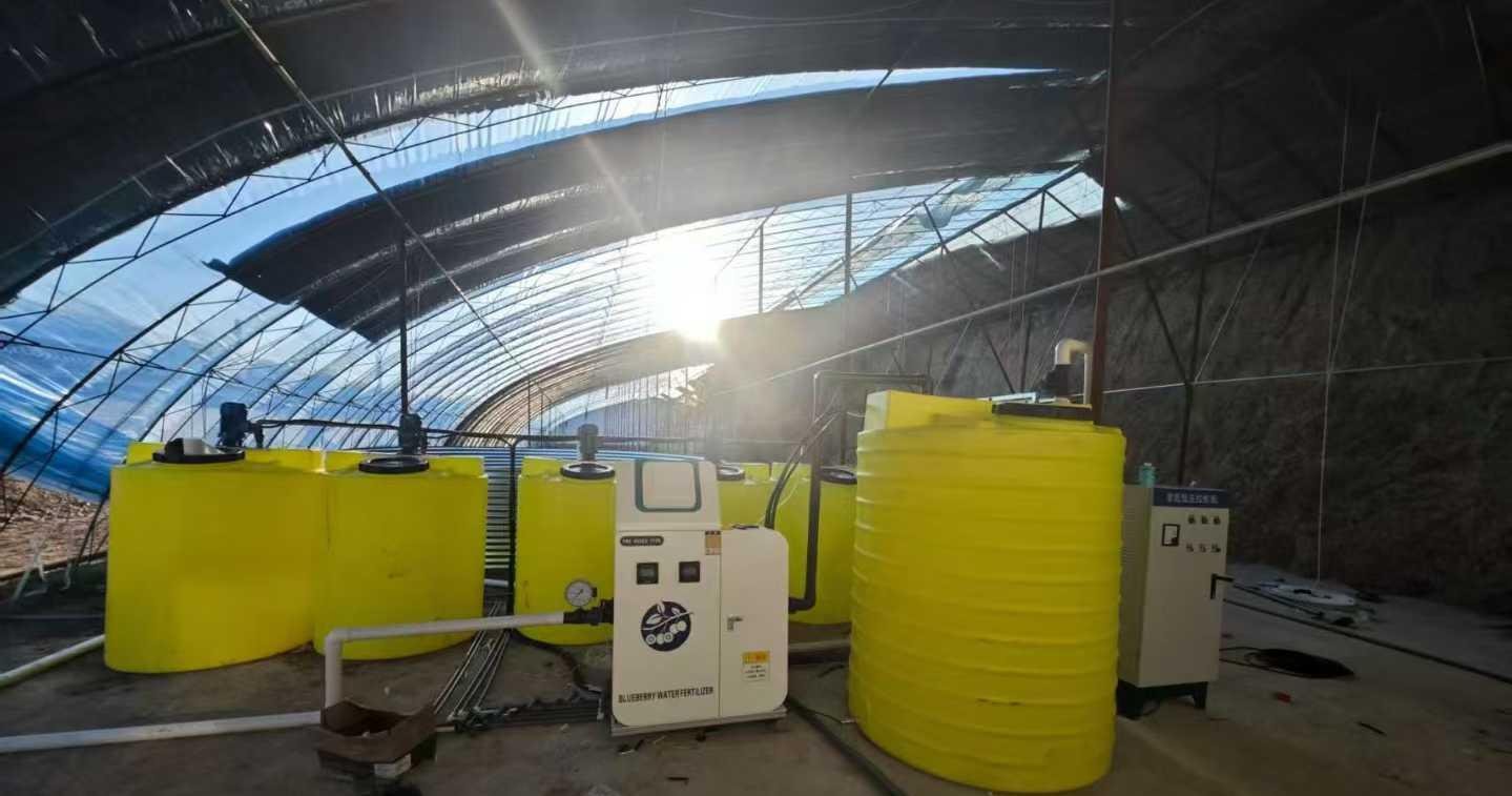 Smart fertigation system in use on a farm, optimizing irrigation and nutrients for healthy crop growth.